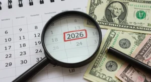 Calendar with 2026 highlighted and financial documents, representing the 2026 COLA increase