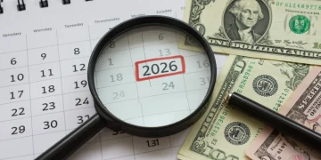 Calendar with 2026 highlighted and financial documents, representing the 2026 COLA increase