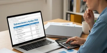 Persona analizando documentos fiscales y calculando ayudas para la Renta 2026 en España.