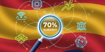 Gráfico moderno representando la digitalización empresarial en España, con iconos de tecnología y crecimiento, destacando una subvención del 70%.
